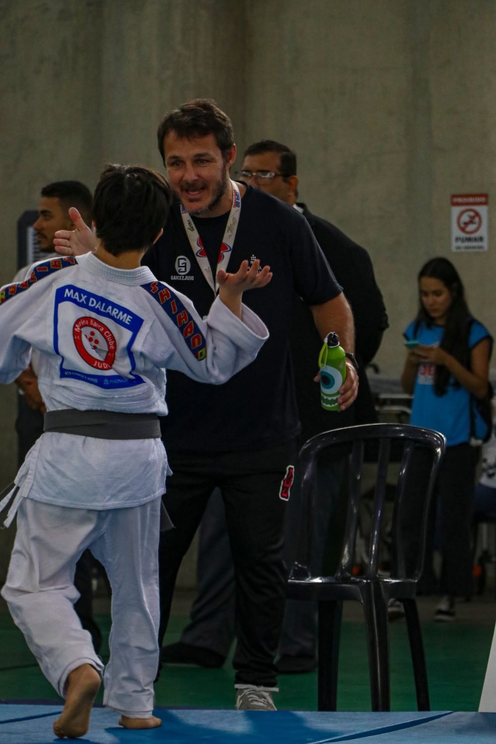 Professor e aluno da Garcez Judô durante a competição